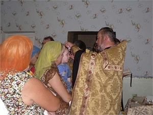 После таинства крещения малыши стали спокойнее. Фото с сайта kp.ua