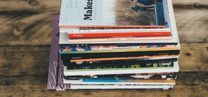 Тысячу гривен за вакцинацию разрешили тратить на подписку на газеты и журналы