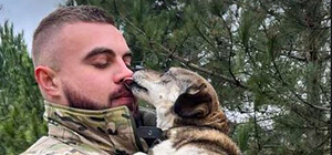 Запорожский полицейский спас собаку из прифронтового Орехова (фото)