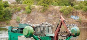 Детские велосипеды и холодильники: водолазы рассказали, что находится на дне карьера на Красном Камне