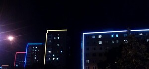 Разноцветные огни: в Харькове оригинально подсветили жилые дома