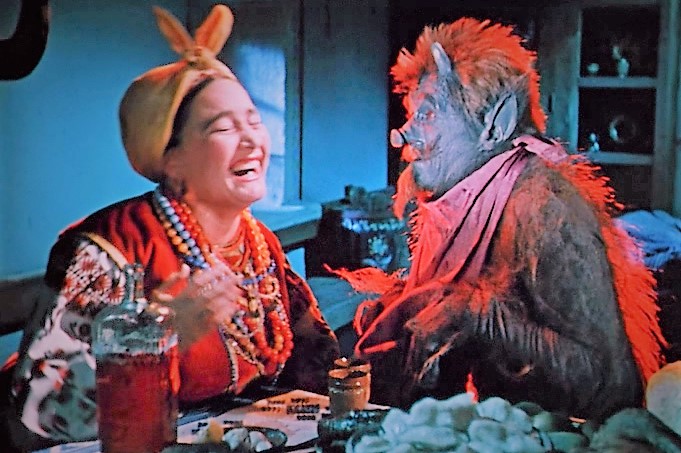 Солоха и Черт трапезничают.