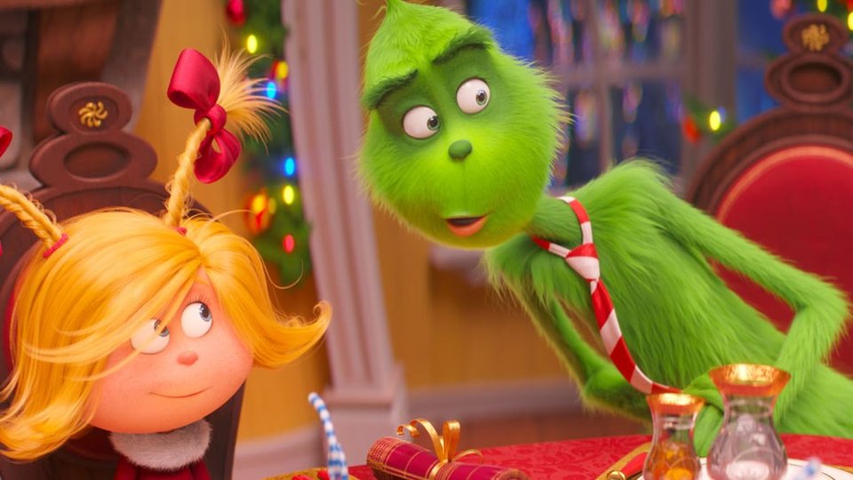 Гринч общается с девочкой.